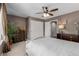 Comfortable bedroom with carpet, ceiling fan, closet and dresser with decor at 20182 E Maplewood Pl, Centennial, CO 80016