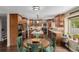 Open kitchen design with an island, breakfast nook, and plenty of cabinet space at 20182 E Maplewood Pl, Centennial, CO 80016