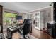 Spacious home office featuring bright window and glass paneled doors at 20182 E Maplewood Pl, Centennial, CO 80016