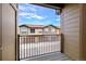 Balcony view of townhomes with garages, showcasing the community's exterior at 8421 Galvani Trl # E, Littleton, CO 80129