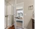 Bathroom showcasing a glass shower and view into the bedroom at 8421 Galvani Trl # E, Littleton, CO 80129