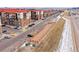 Overhead view of the community dog park, bordering townhomes and featuring a fenced-in area for pets at 8421 Galvani Trl # E, Littleton, CO 80129