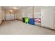 Spacious unfinished two-car garage for secure parking and storage at 8421 Galvani Trl # E, Littleton, CO 80129