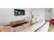 Contemporary living room with a mounted TV and a comfy beanbag chair at 1220 S Elm St, Denver, CO 80246