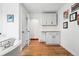Office area featuring white cabinets, stylish wood countertop, and new lighting at 1220 S Elm St, Denver, CO 80246
