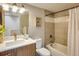 Bathroom featuring a tub, updated vanity and natural light, blending functionality with style at 1231 Cedar Ave, Boulder, CO 80304