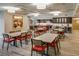 Large dining area featuring seating for many with a peek into the kitchen at 1231 Cedar Ave, Boulder, CO 80304