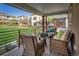 Relaxing front porch with comfortable seating and views of the landscaped front yard and neighborhood homes at 1231 Cedar Ave, Boulder, CO 80304