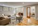 Inviting living room with hardwood floors, a comfortable sofa, and a stylish rug at 1231 Cedar Ave, Boulder, CO 80304
