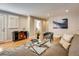 Cozy living room with hardwood floors, stylish decor, and a comfortable seating area at 1231 Cedar Ave, Boulder, CO 80304