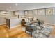 Cozy living room with hardwood floors, a comfortable sectional sofa, and plenty of natural light at 1231 Cedar Ave, Boulder, CO 80304