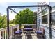 Outdoor patio area with string lights and stylish seating, perfect for enjoying warm evenings and relaxing outdoors at 6694 E 129Th Ave, Thornton, CO 80602