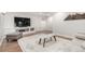 Finished basement with light wood flooring, modern decor, and entertainment area, perfect for relaxing and entertaining at 6694 E 129Th Ave, Thornton, CO 80602