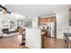 Bright kitchen featuring stainless steel appliances, breakfast bar, and seamlessly connects to the living area at 6694 E 129Th Ave, Thornton, CO 80602