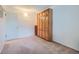 Neutral bedroom featuring a recessed light and built-in wood cabinet at 1576 S Ursula Ct, Aurora, CO 80012