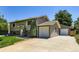 Beautiful home featuring siding, well-maintained yard, and driveway to attached garage at 1576 S Ursula Ct, Aurora, CO 80012