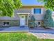Charming home featuring well-maintained lawn and front garden at 1576 S Ursula Ct, Aurora, CO 80012