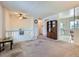 Bright living room with staircase, built-in shelves, and an open feel at 1576 S Ursula Ct, Aurora, CO 80012