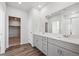 Bathroom boasts double vanity and walk-in shower at 1386 Bloom St, Brighton, CO 80601