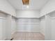 Spacious walk-in closet with ample shelving and hanging space at 1386 Bloom St, Brighton, CO 80601