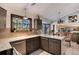 Modern kitchen with granite countertops and wood cabinets at 4696 S Yates St, Denver, CO 80236