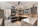 Modern kitchen with granite counters and stainless steel appliances at 4696 S Yates St, Denver, CO 80236