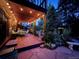 Covered patio with string lights and seating at 4696 S Yates St, Denver, CO 80236