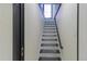 Staircase leading to the upper level at 6735 W 2Nd Ave, Lakewood, CO 80226