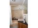 Cozy bathroom with pink fixtures, vanity sink, shower with curtain, and a ceramic tile backsplash at 22598 Westview Ave, Golden, CO 80401
