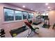 Bright exercise room with large windows and a variety of fitness equipment at 22598 Westview Ave, Golden, CO 80401