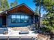 Home featuring an inviting outdoor fire pit area and breathtaking mountain views at 22598 Westview Ave, Golden, CO 80401