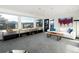 Bright living room featuring large windows with mountain views, modern decor, and stylish furnishings at 22598 Westview Ave, Golden, CO 80401