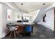 Stylish home office or study featuring a modern desk, chairs, and unique architectural elements at 22598 Westview Ave, Golden, CO 80401