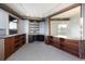 Office space with built-in shelving and desk area, featuring natural wood accents at 22598 Westview Ave, Golden, CO 80401