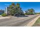 Exterior view of a complex with well-maintained landscaping and inviting curb appeal at 3141 S Tamarac Dr # 110G, Denver, CO 80231