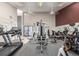 Well-equipped fitness center featuring treadmills and weight machines for a complete workout experience at 3141 S Tamarac Dr # 110G, Denver, CO 80231