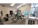 On-site gym with multiple workout machines for residents to enjoy at 3141 S Tamarac Dr # 110G, Denver, CO 80231