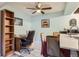 Bright office space with tile floors, a desk, and views into the kitchen area at 3141 S Tamarac Dr # 110G, Denver, CO 80231