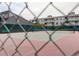 Community tennis court is perfect for outdoor recreation with friends and neighbors at 3141 S Tamarac Dr # 110G, Denver, CO 80231