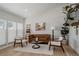 Bright living room with modern decor, hardwood floors, and large windows at 8559 W 75Th Pl, Arvada, CO 80005