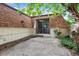 Back patio surrounded by lush greenery, offering a private outdoor space to relax and entertain guests at 46 Douglas Dr, Broomfield, CO 80020