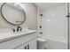 Bathroom featuring a modern vanity, updated fixtures, and a tiled shower, providing a spa-like experience at 46 Douglas Dr, Broomfield, CO 80020