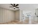 Modern kitchen with white cabinets, stainless steel appliances, and a breakfast bar, offering style and functionality at 46 Douglas Dr, Broomfield, CO 80020