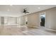 Spacious living room featuring recessed lighting, wood floors and ample natural light at 46 Douglas Dr, Broomfield, CO 80020