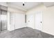 Bedroom featuring a murphy bed and two closet doors at 2001 Lincoln St # 3121, Denver, CO 80202