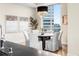 Contemporary dining space with scenic city views, chandelier, and modern decor at 2001 Lincoln St # 3121, Denver, CO 80202