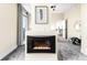 Bright living room with modern fireplace and open layout at 2001 Lincoln St # 3121, Denver, CO 80202