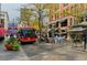 Vibrant outdoor plaza with a free mall ride bus, planters, benches, and shops, perfect for enjoying city life at 2001 Lincoln St # 3121, Denver, CO 80202