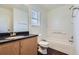 Bathroom includes vanity with dark counter and bath with shower at 20000 E Mitchell Pl # 39, Denver, CO 80249