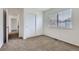 Cozy bedroom featuring a closet and a window for natural light at 20000 E Mitchell Pl # 39, Denver, CO 80249